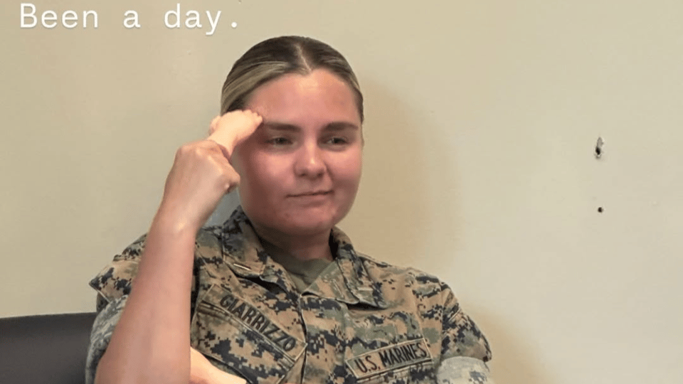 Olivia posing in Marine Corps uniform